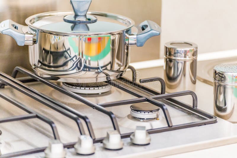 Steel pot on the stove stock image. Image of kitchen 77374153