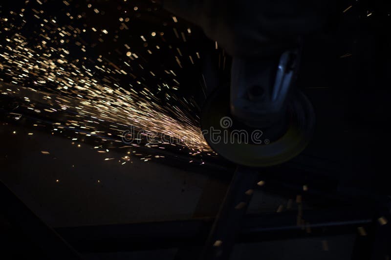 Steel Processing. Metal Cutting. Sparks from Friction Stock Photo