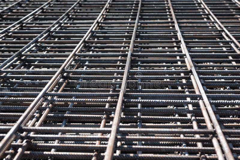 Steel Rebars for reinforced concrete construction site. Piled iron reinforcement workpieces