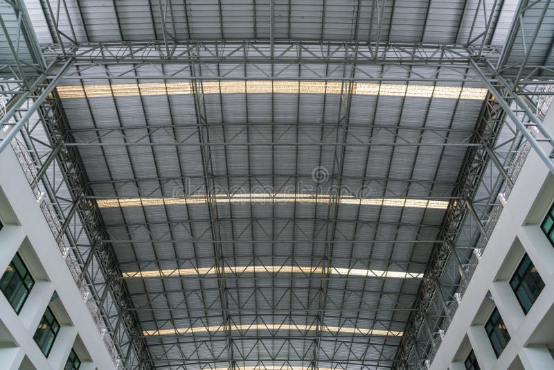 Steel roof structure under the roof of the industrial building.