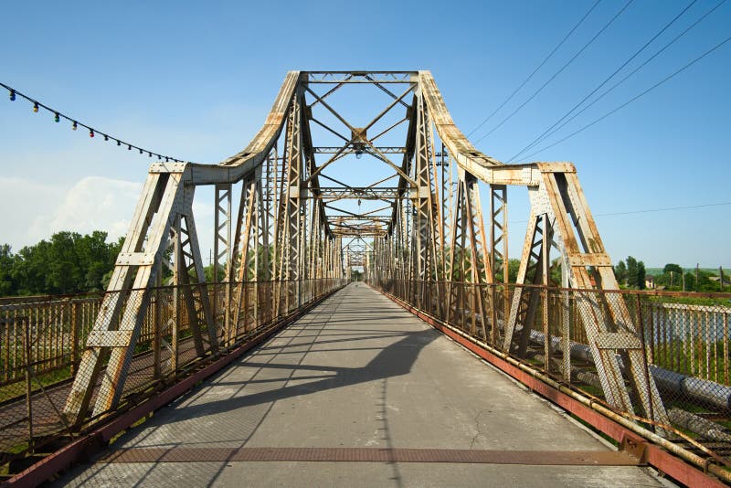 Steel Walking Bridge Across River. Stock Photo Image of perspective