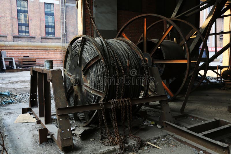 Steel wire rope drum full of sludge royalty free stock photography