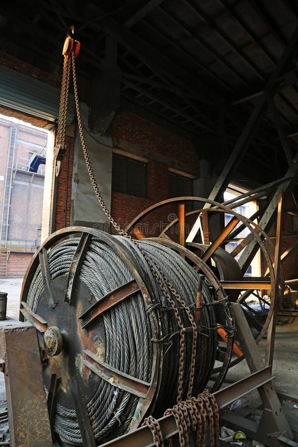 Steel wire rope drum full of sludge royalty free stock image