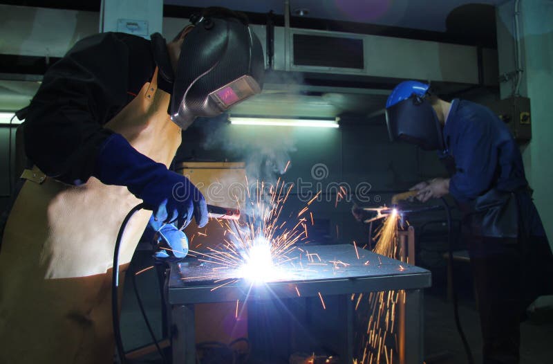 Steel workers welding stock image Steel workers welding stock image