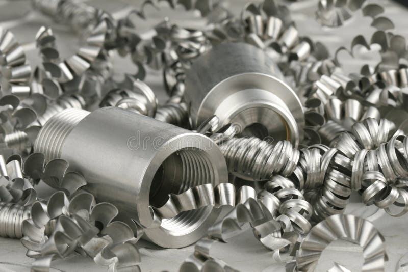 Steel workpiece and turnings royalty free stock image