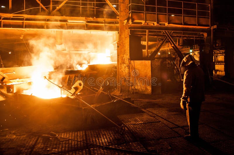 steelworker-pouring-liquid-titanium-arc-furnace-131715117.jpg