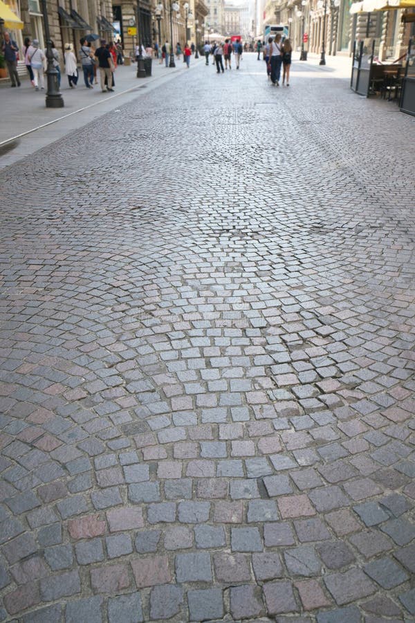 Steenbestrating van via Dante, Milaan stock afbeelding Steenbestrating van via Dante, Milaan stock afbeelding