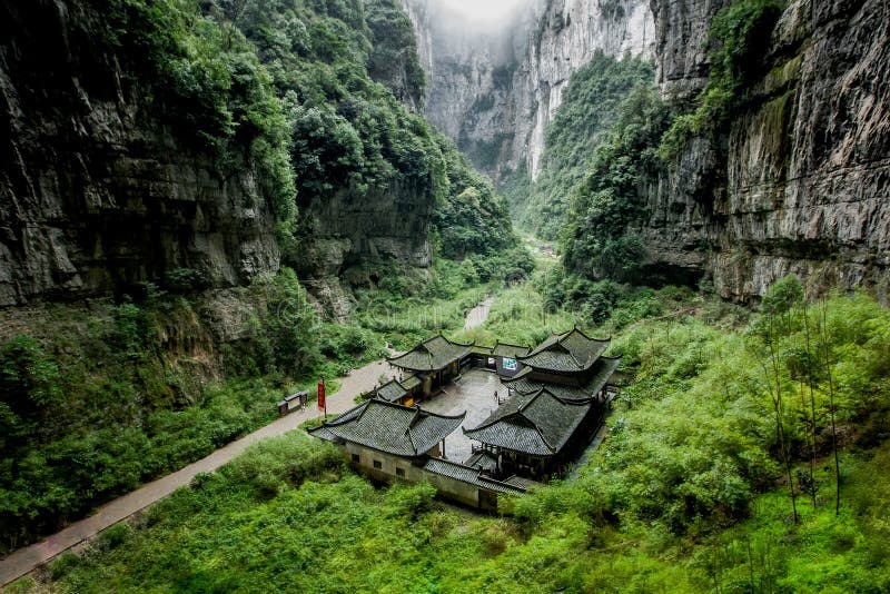 Wulong located in Chongqing, south-west of China. Which has three natural giant stone gates. It is one of the largest nature stone gates in the world. The film Transformer 4 was shooting at here. this building is a post-transfer-station for hundreds years, and it is a national culture relic protection site of China. Wulong located in Chongqing, south-west of China. Which has three natural giant stone gates. It is one of the largest nature stone gates in the world. The film Transformer 4 was shooting at here. this building is a post-transfer-station for hundreds years, and it is a national culture relic protection site of China.