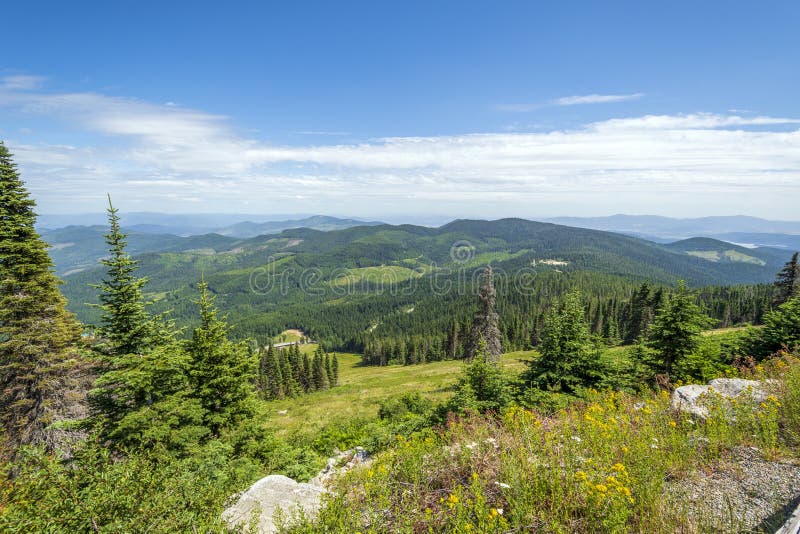 Steep mountain and lake views from the peak of Mt Spokane State Park overlooking the Spokane Washington area on a summer day stock photos Steep mountain and lake views from the peak of Mt Spokane State Park overlooking the Spokane Washington area on a summer day stock photos
