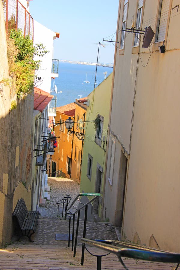 Steep stairs in an alley in the old town alfama of lisbon, portugal