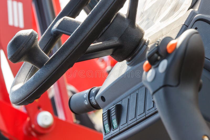 Steering Wheel and Operating Control Panel in Industrial or Agricultural Machine Stock Image