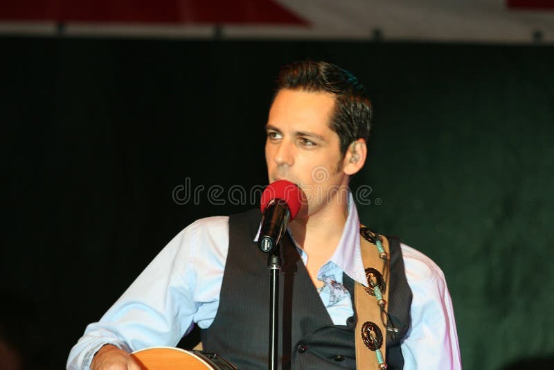 Stefan Banica Jr. Singing in Front of the Spectators on a Stage