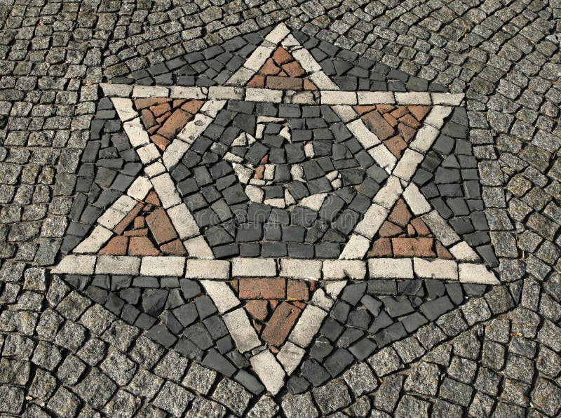 Granite cobbled floor with Hebrew Star of David ornament. Granite cobbled floor with Hebrew Star of David ornament