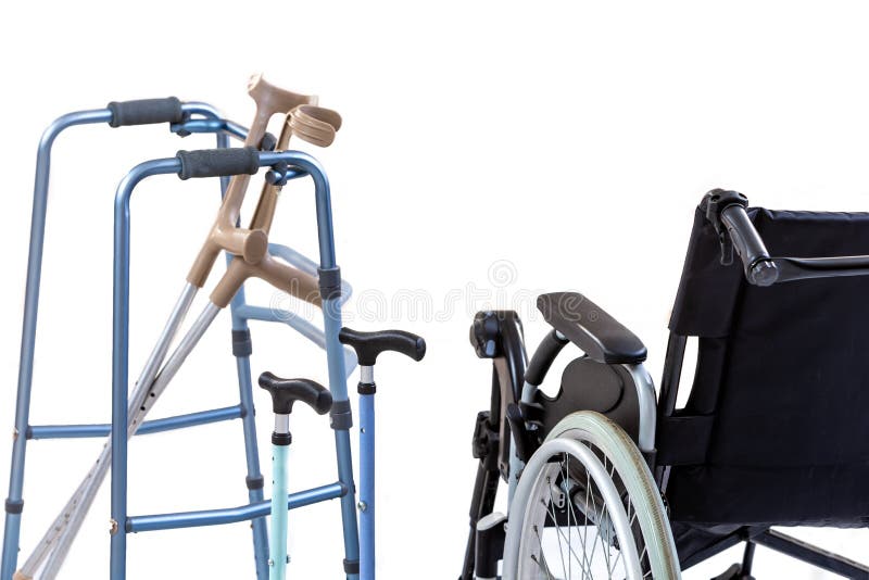 Set of mobility aids including a wheelchair, walker, crutches, quad cane, and forearm crutches. Set of mobility aids including a wheelchair, walker, crutches, quad cane, and forearm crutches.