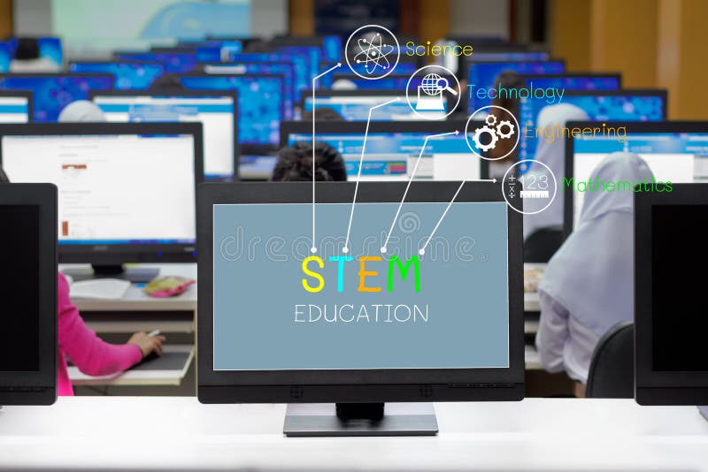 STEM education concept, computer screen display text on screen with student studying in computer classroom royalty free stock images