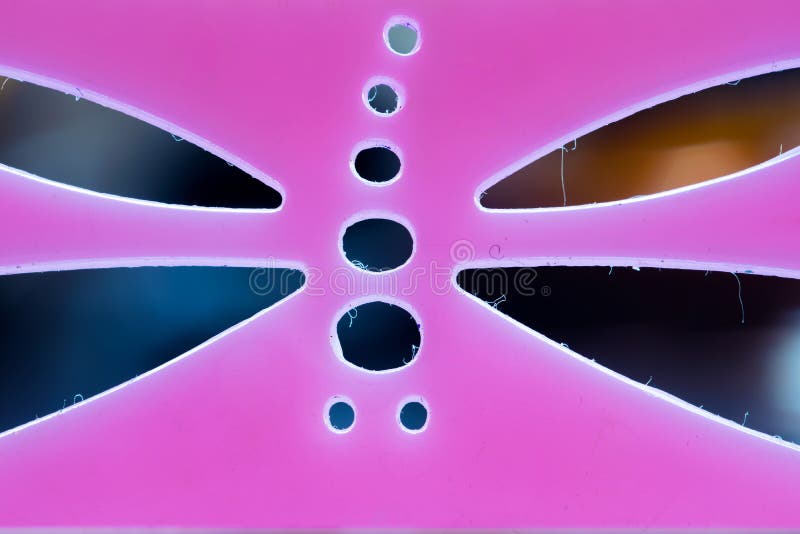 Sjabloon in de vorm van een roze libelle. Macro royalty-vrije stock fotografie