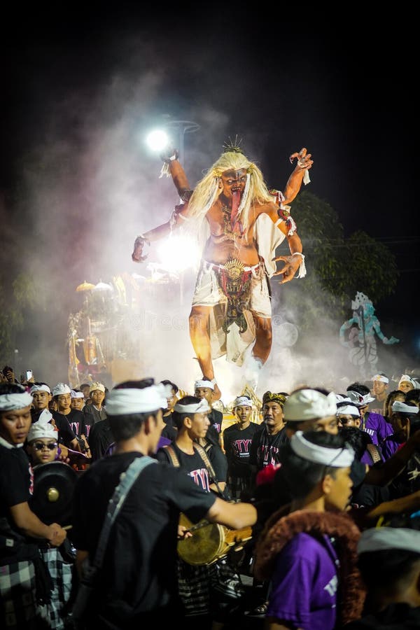 Step into the heart of Balinese tradition with this captivating snapshot of the Ogoh-Ogoh parade in Catur Muka,Denpasar,Bali. As the rhythmic beat of drums fills the air,larger-than-life mythological figures come to life,each intricately crafted to embody ancient tales and spiritual forces. Against the backdrop of the vibrant sunset,the parade unfolds like a moving canvas of colors,emotions,and collective energy. This photograph encapsulates the essence of cultural devotion,as the community unites to honor their roots and propel these mesmerizing creations through the streets,bringing a surge of artistic,spiritual,and communal vitality to the heart of Bali. Step into the heart of Balinese tradition with this captivating snapshot of the Ogoh-Ogoh parade in Catur Muka,Denpasar,Bali. As the rhythmic beat of drums fills the air,larger-than-life mythological figures come to life,each intricately crafted to embody ancient tales and spiritual forces. Against the backdrop of the vibrant sunset,the parade unfolds like a moving canvas of colors,emotions,and collective energy. This photograph encapsulates the essence of cultural devotion,as the community unites to honor their roots and propel these mesmerizing creations through the streets,bringing a surge of artistic,spiritual,and communal vitality to the heart of Bali.