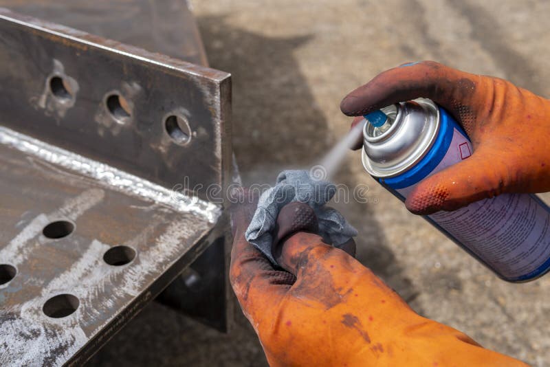 Use Spray Solvent Remover To Cleaning the Welding Surface Stock Photo