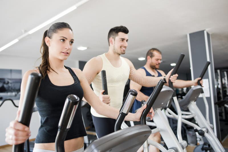 Steppers exercises at gym royalty free stock photos Steppers exercises at gym royalty free stock photos