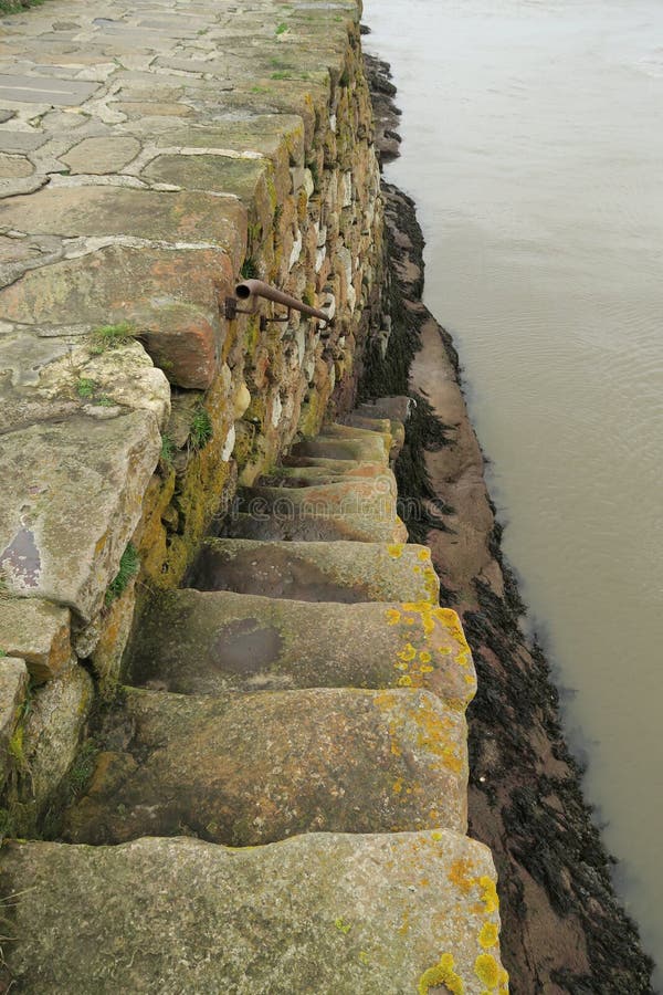 Steps down from Saint Andrews Harbour wall