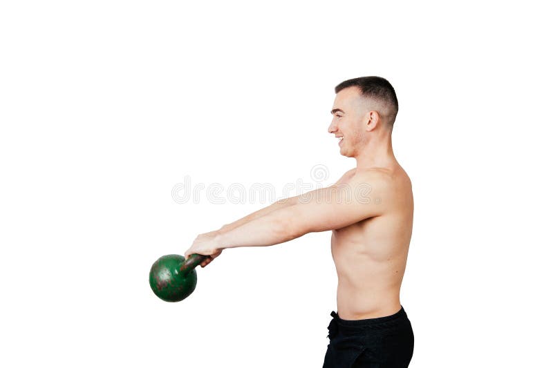 Sterke jonge mens die een kettlebell slingeren Sterkte en motivatie stock afbeeldingen Sterke jonge mens die een kettlebell slingeren Sterkte en motivatie stock afbeeldingen