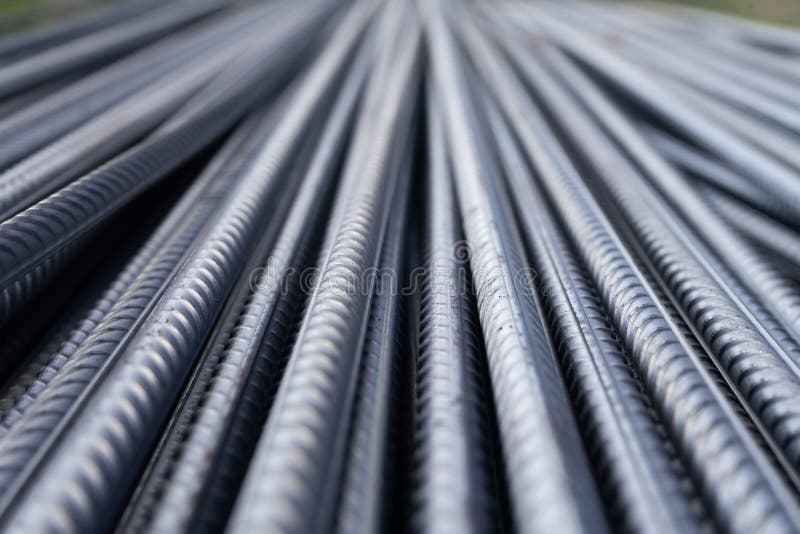 Sterta ciężkiego metalu wzmacnienia bary z okresową profilową teksturą Zamyka w górę stalowej budowy armatury Abstrakcjonistyczny zdjęcia stock Sterta ciężkiego metalu wzmacnienia bary z okresową profilową teksturą Zamyka w górę stalowej budowy armatury Abstrakcjonistyczny zdjęcia stock