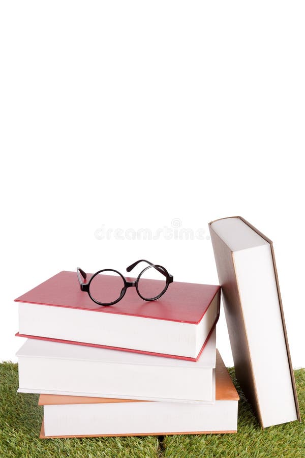 Sterta książki z parą eyeglasses fotografia stock Sterta książki z parą eyeglasses fotografia stock