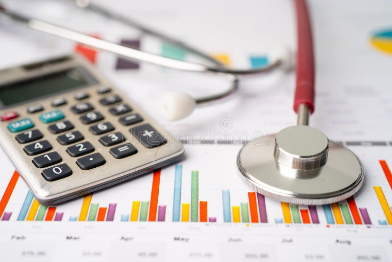 Stethoscope and calculator on chart or graph paper, Financial, account, statistics and business data medical health.