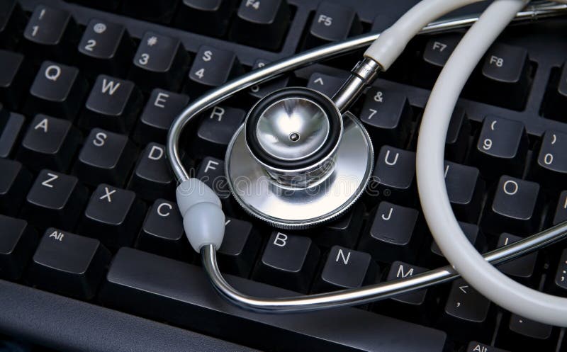 Stethoscope on a computer keyboard