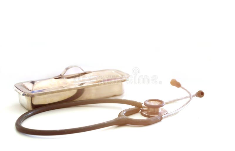 Stethoscope or Ear Pieces of Doctor with Aluminium Box on Blur