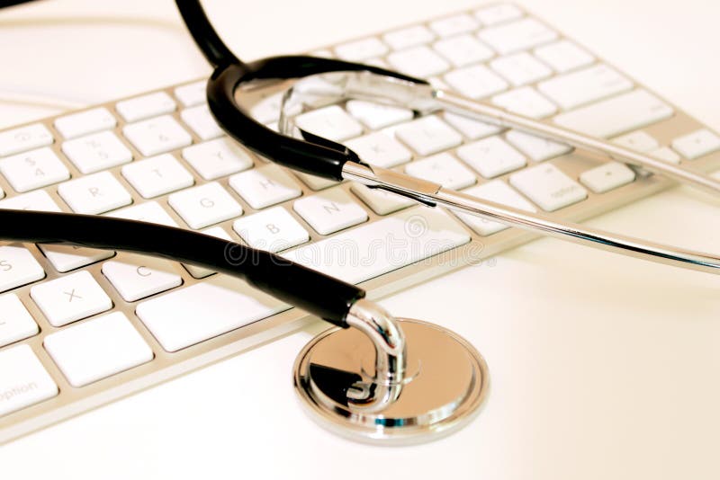 Stethoscope with Keyboard stock photo. Image of practice 20117538