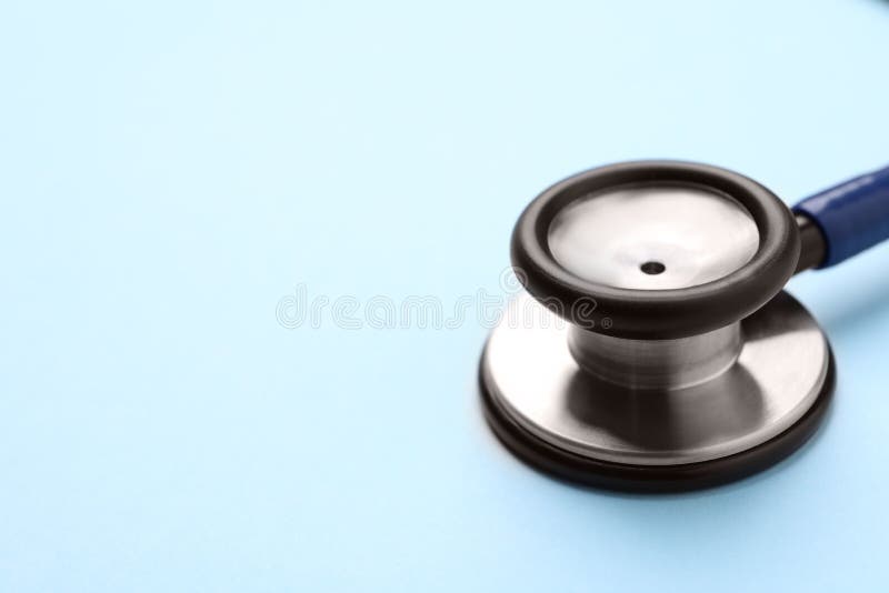 Stethoscope on Light Blue Background. Chickenpox Disease Stock Photo