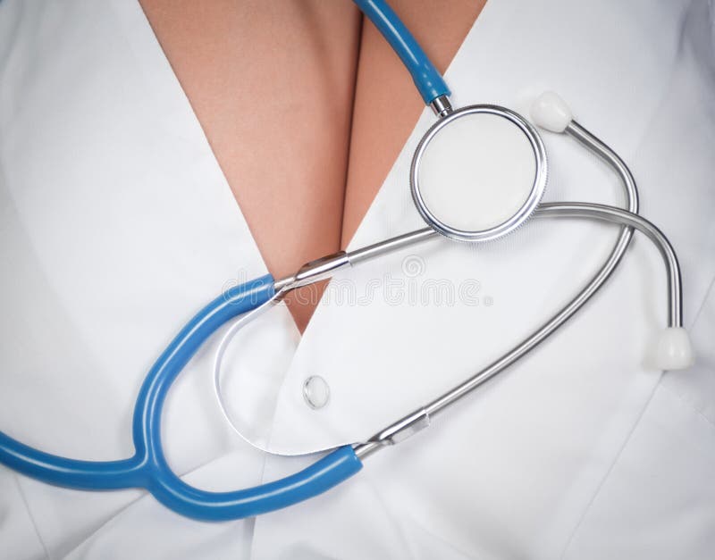 Stethoscope lying on the woman hips doctor