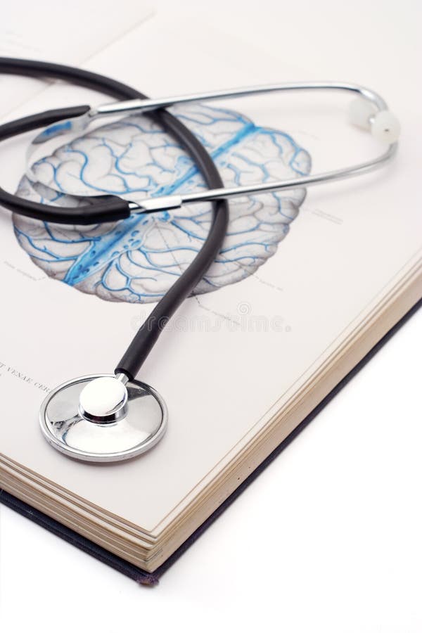 Expensive stethoscope on a medical book. Atlas book stock images, royalty-free photos and pictures