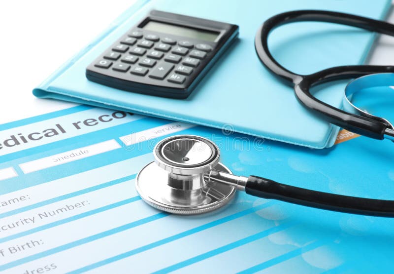 Stethoscope with medical record and calculator on white background. Health care concept stock photos Stethoscope with medical record and calculator on white background. Health care concept stock photos