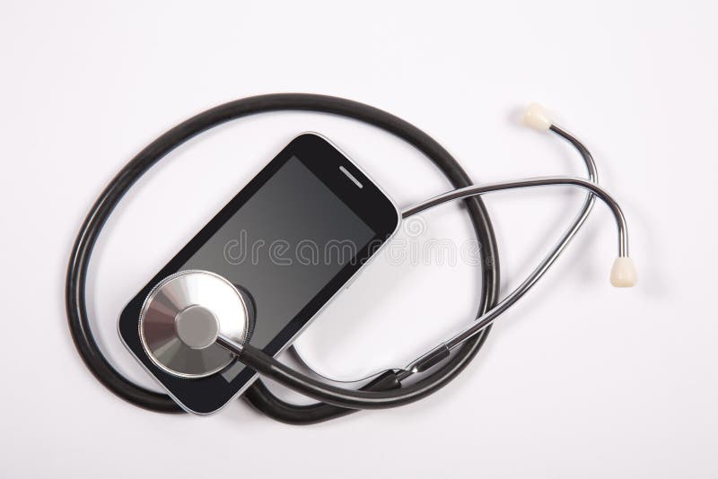 Stethoscope on mobile phone royalty free stock photo Stethoscope on mobile phone royalty free stock photo