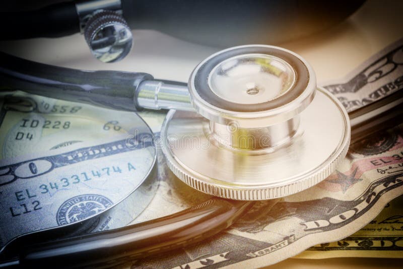 Stethoscope and Money in Soft Light for Medical Cost Saving Stock Image Stethoscope and Money in Soft Light for Medical Cost Saving Stock Image