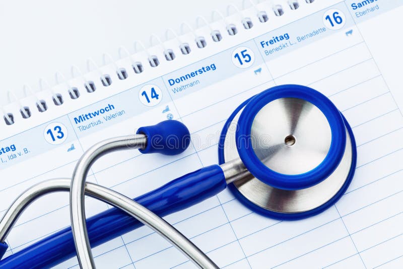 Stetoscopio e calendario. Appuntamento medico fotografie stock Stetoscopio e calendario. Appuntamento medico fotografie stock