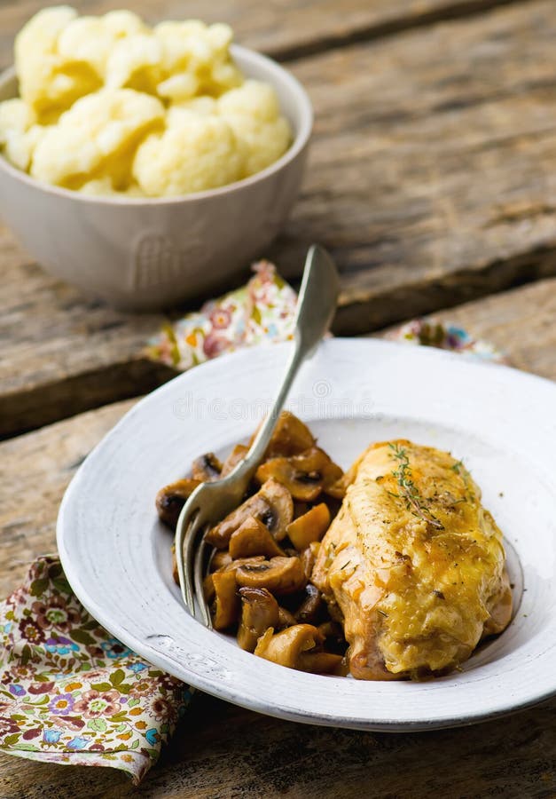 Stewed Chicken Breast with Mushrooms in the Crockpot. Stock Image