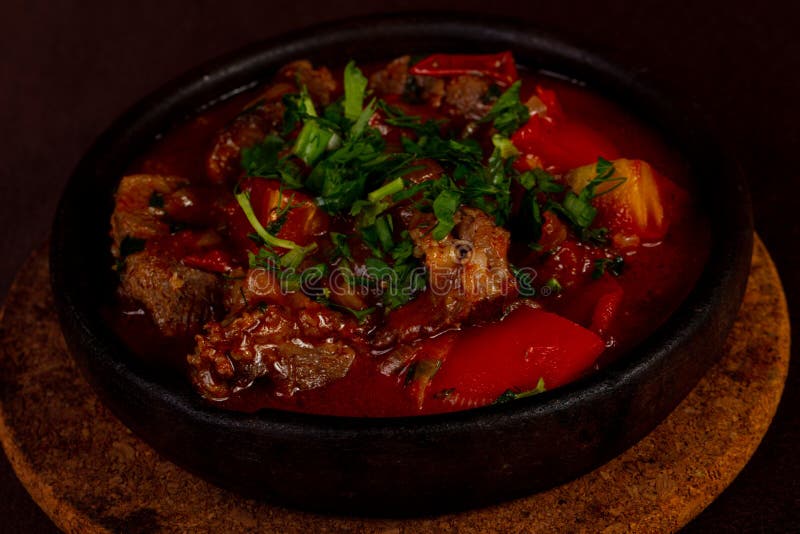 Stewed Lamb in Tomato Sauce Stock Image Image of cuisine, wooden 125610047