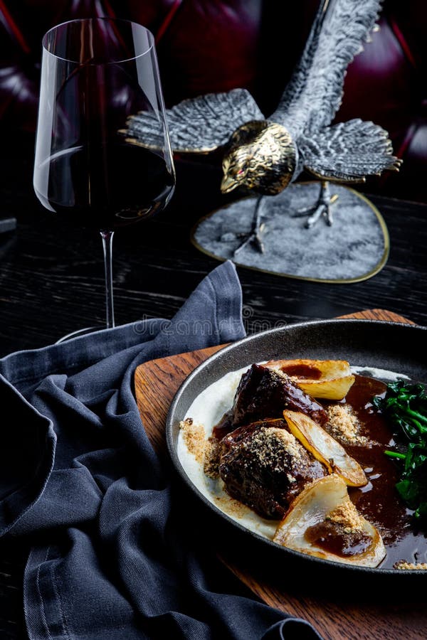 Stewed Veal Cheeks in Red Wine, Served with Mashed Potato. Photo for