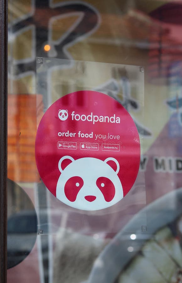 Sticker promoting Foodpanda at the glass window of a restaurant in Ipoh, Malaysia. Sticker promoting Foodpanda at the glass window of a restaurant in Ipoh, Malaysia