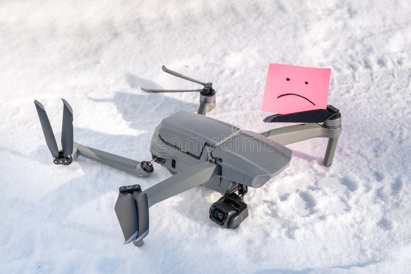 Sticky note with sorry smile in drone propeller blades. stock images