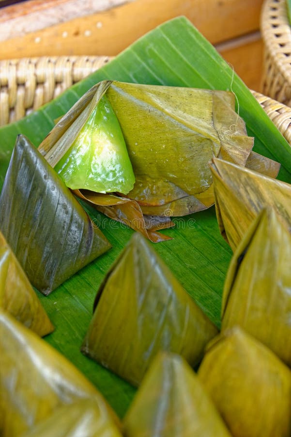 Sticky rice on banana leaf - thai street food. - Stock Image - Everypixel