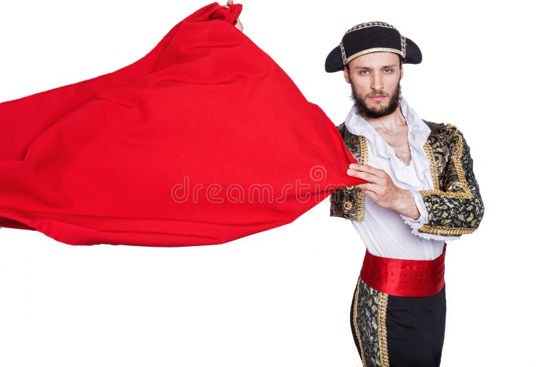 Matador throw a red cape. Studio portrait isolated on a white background. Matador throw a red cape. Studio portrait isolated on a white background