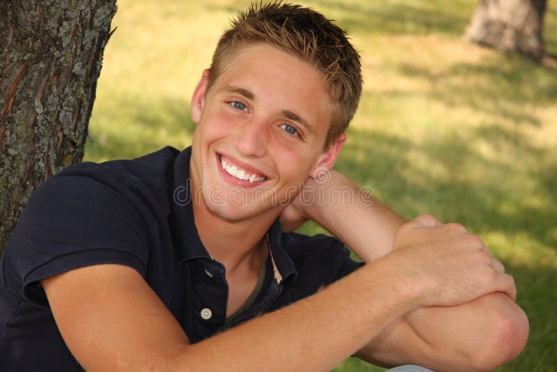 Casual outdoor portrait of young man smile. Casual outdoor portrait of young man smile