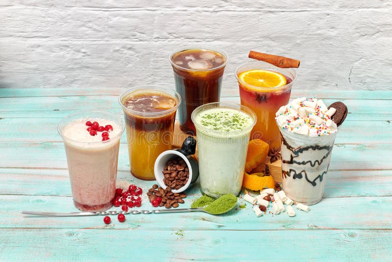 Still Life with a Beautiful Milkshake in a Transparent Glass. Milk Drink is  Very Sweet and Delicious with Marshmallows, Cookies, Stock Image - Image of  shop, drink: 185535899