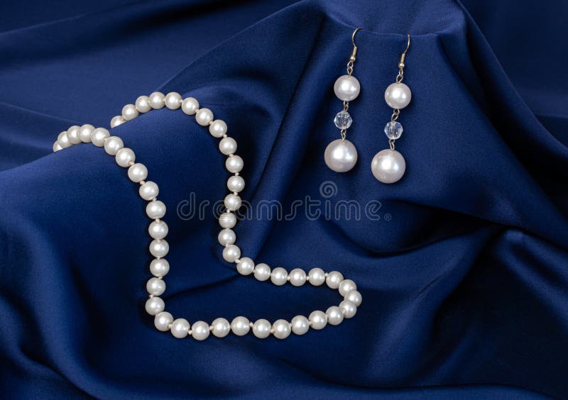 Still Life of Blue Drapery and Pearl Jewelry Stock Photo Image of