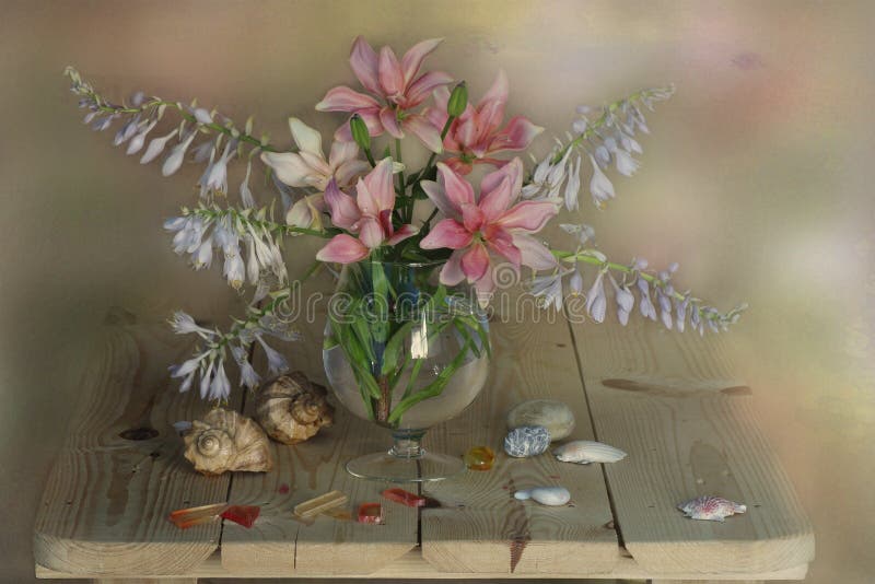 Still life with a bouquet of pink lilies in the water
