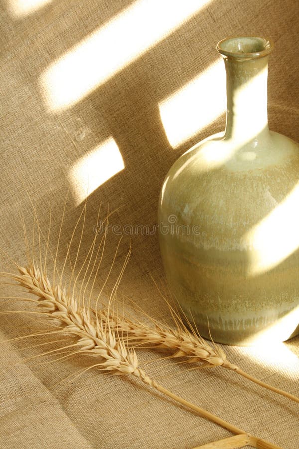 Still Life .Ceramic Jar And Wheat